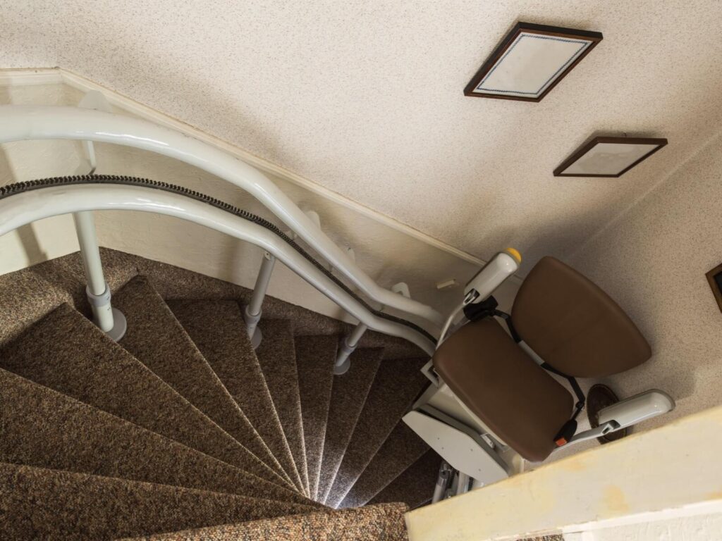 Curved rail stairlift installed in customer home.